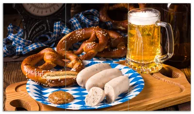 Produktbild von Wallario Herdabdeckplatte aus Glas, Größe 90 x 52 cm 3-teilig, Motiv Bayerische Brotzeit mit Weißwurst, Brezel und Bier