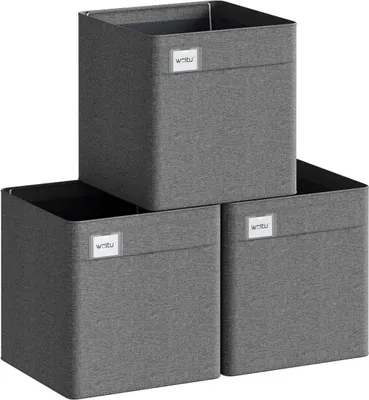 Three dark gray fabric storage boxes are stacked and arranged in a pyramid formation against a white background.
