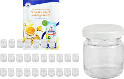 A collection of small glass jars with white lids, arranged in rows, next to a product information booklet.
