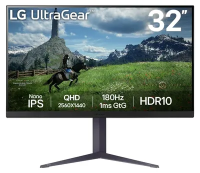 A gaming monitor displaying a fantasy landscape with a knight on horseback.