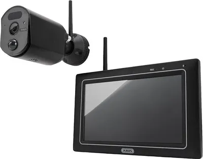 A black wireless security camera and a black monitor are displayed against a white background.