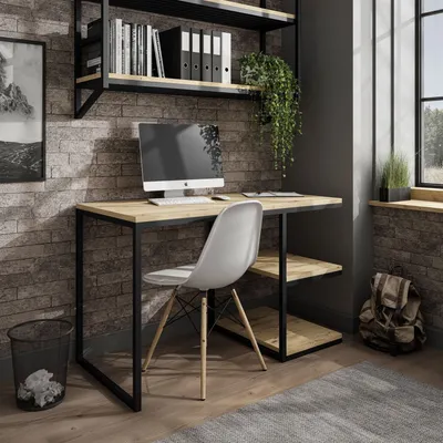 A modern home office setup with a desk, computer, chair, and shelving.