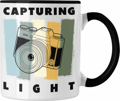 Produktbild von Trendation - Fotograf Tasse Zubehör Fotografie Geschenk Fotografieren Kaffeetasse Geschenkideen Lustige Grafik (Schwarz)