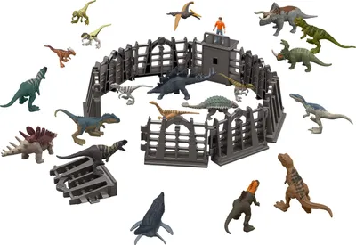 A collection of dinosaur toys and a Jurassic Park-themed enclosure, with a small human figure on top of the enclosure.
