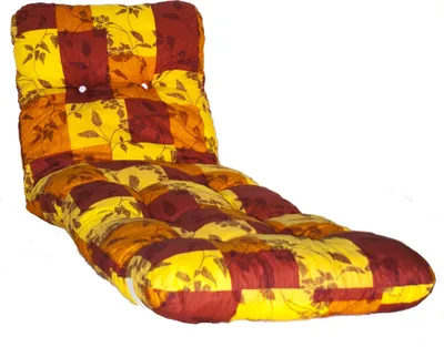 A floor cushion or mattress with a patchwork design.