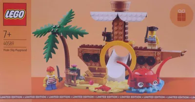 The image shows the box of a LEGO pirate ship playground set.
