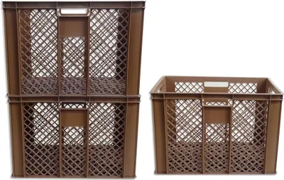 Two stacks of brown plastic crates against a white background.