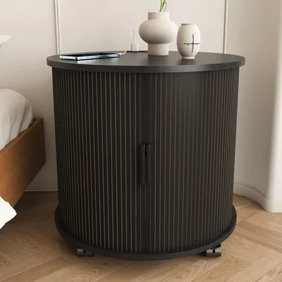 Imagen del producto de Mesita de noche cilíndrica de estilo mid-century, 60x60x60 cm, color . Mesita auxiliar con ruedas, que incluye estación de carga, 2 puertos USB, enchufe, puerta corredera y espacio de almacenamiento