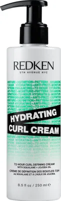 A product shot of a bottle of Redken Hydrating Curl Cream.