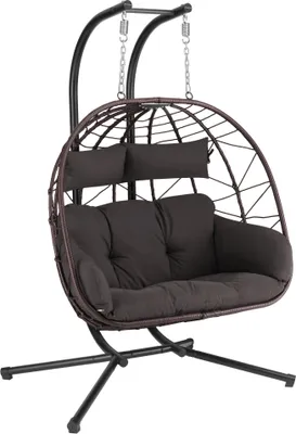 A brown hanging chair for two people with a black metal stand, shown against a white background.