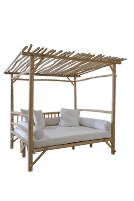 A wooden outdoor daybed with a canopy and white cushions, presented against a white background.