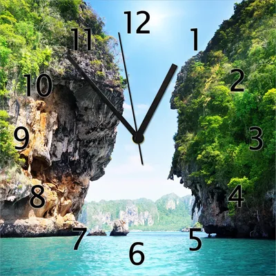Produktbild von Wallario Design Wanduhr Felsenschlucht am Meer in Thailand aus Echtglas, Größe 30 x 30 cm