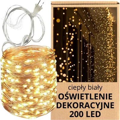 A product shot of a string of LED lights coiled on a white surface, next to its packaging.