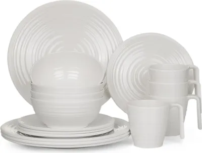 A set of white melamine dishes, including plates, bowls, and mugs, arranged on a white background.