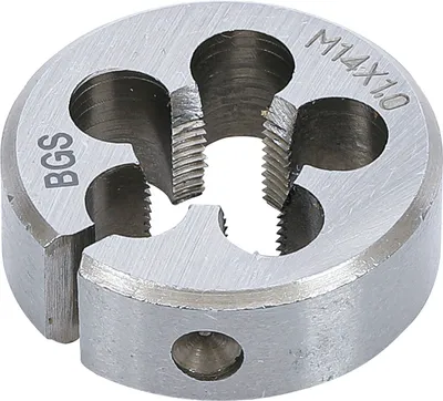 A close-up view of a metal threading die.