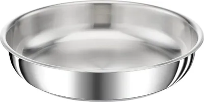 A close-up, studio shot of a stainless steel frying pan.