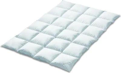 A white down comforter is shown lying flat on a white background.