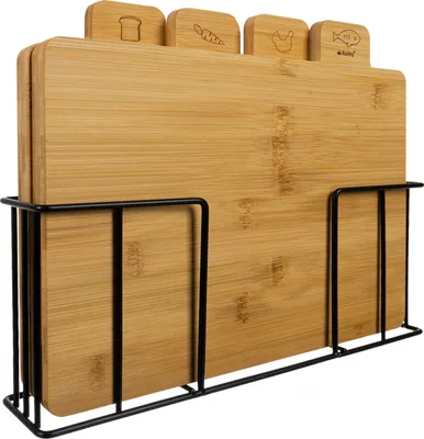 A set of four bamboo cutting boards in a black metal rack.