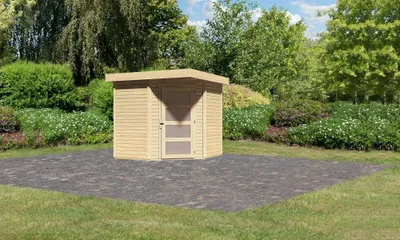 A wooden garden shed is situated on a paved area in a garden setting, surrounded by lush greenery and flowers.