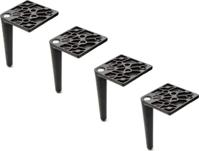 Four black furniture legs are arranged diagonally on a white background.