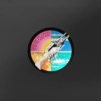 Produktbild von Pink Floyd - Wish You Were Here (Anniversary Edition) (Deluxe Edition) (Box Set) (Clear Coloured) (4 LP + 7" Single + 2 CD + 1 Blu-Ray)