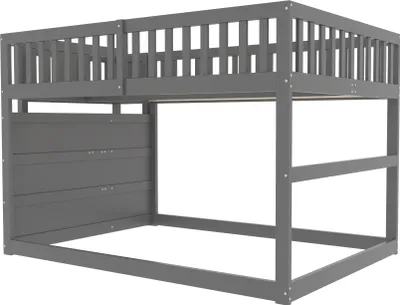 A grey wooden loft bed with a railing and a storage unit on the side.