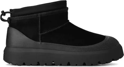 A black UGG Ultra Mini Weather Hybrid boot is shown from the side against a white background.