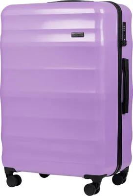 A studio shot of a large purple suitcase.
