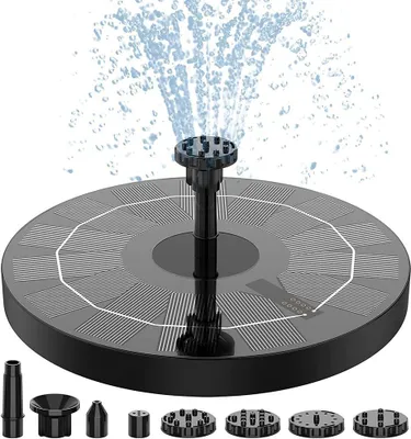A solar-powered fountain pump with multiple nozzle attachments, shown in operation with water spraying upwards.
