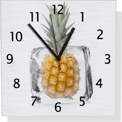 Produktbild von Wallario Design Wanduhr Ananas in Eiswürfel - Eiskaltes Obst aus Aluverbund, Größe 30 x 30 cm