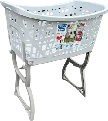 A light gray laundry basket with a patterned design, elevated on a gray stand. The basket has a label with product information and images.