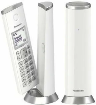 A white Panasonic cordless phone with its charging base and an additional charging base.