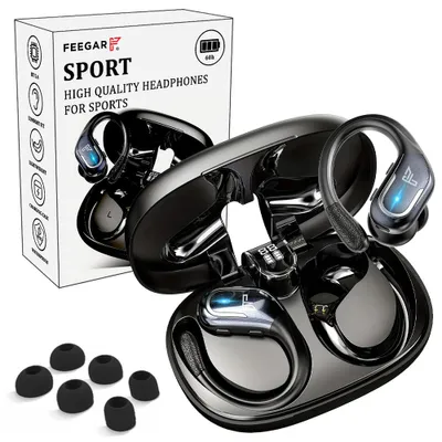 A product shot of wireless earbuds and their charging case, with a box in the background.