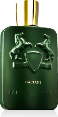 A green perfume bottle with gold accents.