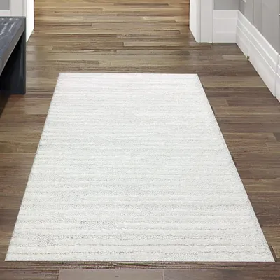 Produktbild von Wohnzimmer Schlafzimmer Teppich mit Hoch-Tief-Effekt und gemusterten Linien in der Farbe creme Größe - 160 x 230 cm