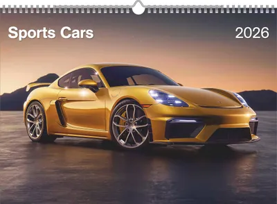 A golden sports car is parked on a reflective surface with a sunset in the background.