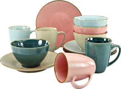 A collection of ceramic tableware, including plates, bowls, and mugs, in various pastel colors.