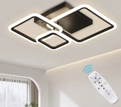 A modern ceiling light fixture with multiple square frames, shown mounted on a ceiling. A remote control is shown in the foreground with a Wi-Fi signal icon.