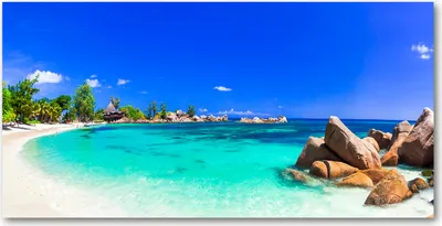 Produktbild von Tulup® Leinwandbild -100x50 cm - Wandkunst - Drucke auf Leinwand - Leinwanddruck  - Landschaften - Blau - Seychellen Strand