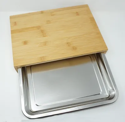 Produktbild von Schneidebrett 38x27x7 cm aus Bambus mit herausnehmbarer Edelstahlschale