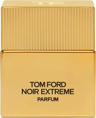 A close-up studio shot of a gold colored perfume bottle.