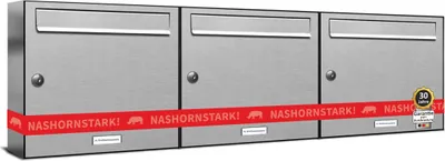 A row of three stainless steel mailboxes is shown against a white background. A red band with text and logos wraps around the bottom of the mailboxes.