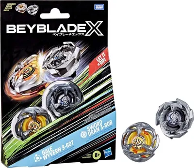 A product box for Beyblade X toys, with two individual toys shown separately to the right of the box.
