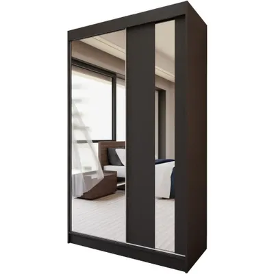 A modern sliding door wardrobe with mirrored doors, reflecting a bedroom interior.