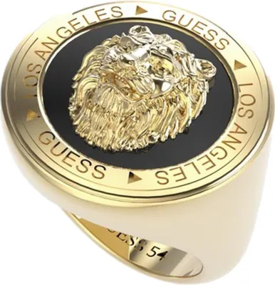 A close-up studio shot of a gold-colored ring with a lion's head design.