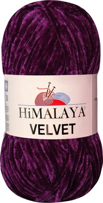 A ball of purple velvet yarn on a white background.
