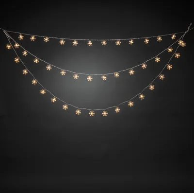 Obrázek produktu pro Konstsmide LED světelný závěs, 44 čirých sněhových vloček, 44 teplých bílých diod, 4,5 V, venkovní (IP44), průhledný kabel - 4042-103