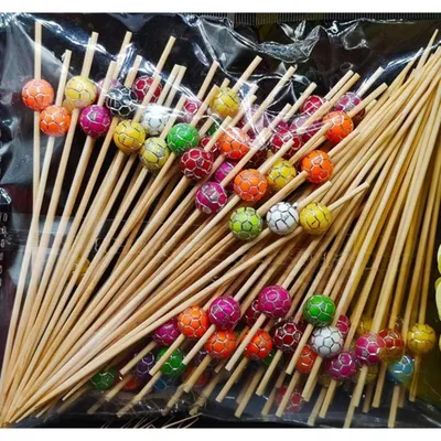 Produktbild von Cocktail-Sticks 100 Stück Bambus mit Goldperle Fußball Mehrfarbig 12 cm