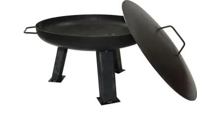 A black metal fire pit with a lid resting on its side, shown on a white background.