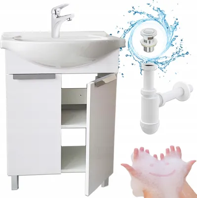 A white bathroom vanity with a ceramic sink and chrome faucet, along with plumbing parts and a smiley face made of soap bubbles.